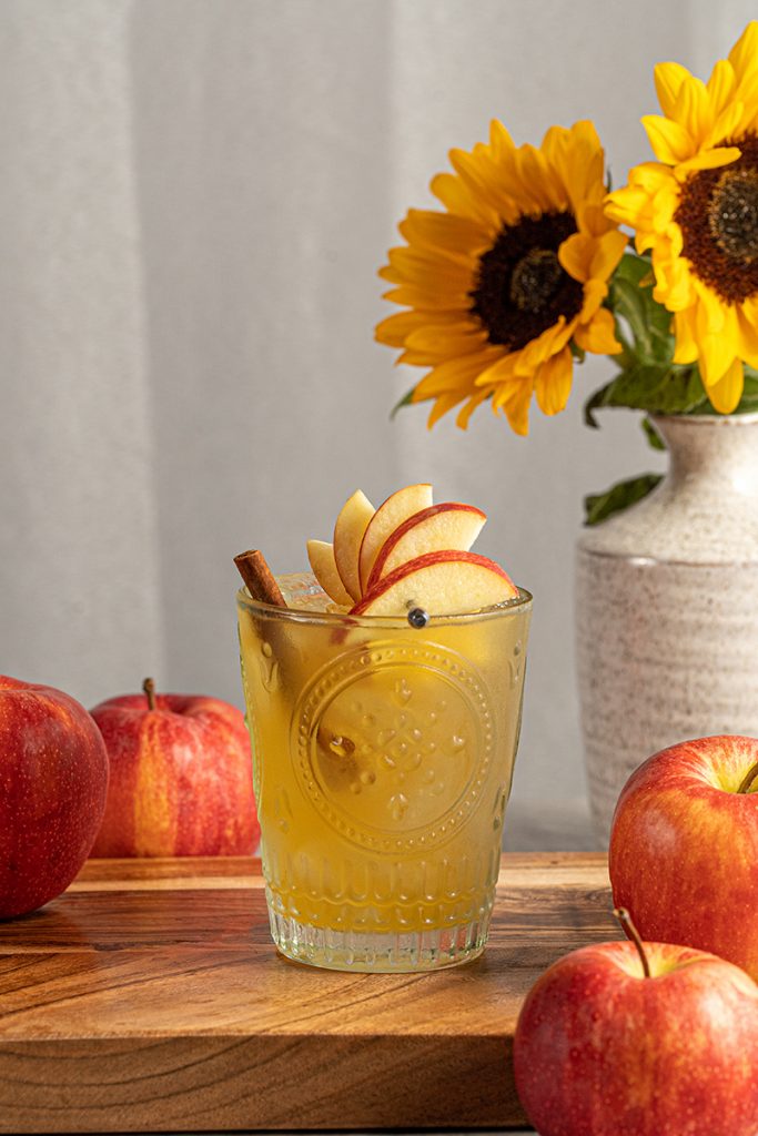 This autumn gin cocktail is sweet made with fresh apple cider and has a little kick of spicy ginger. Perfect for fall.